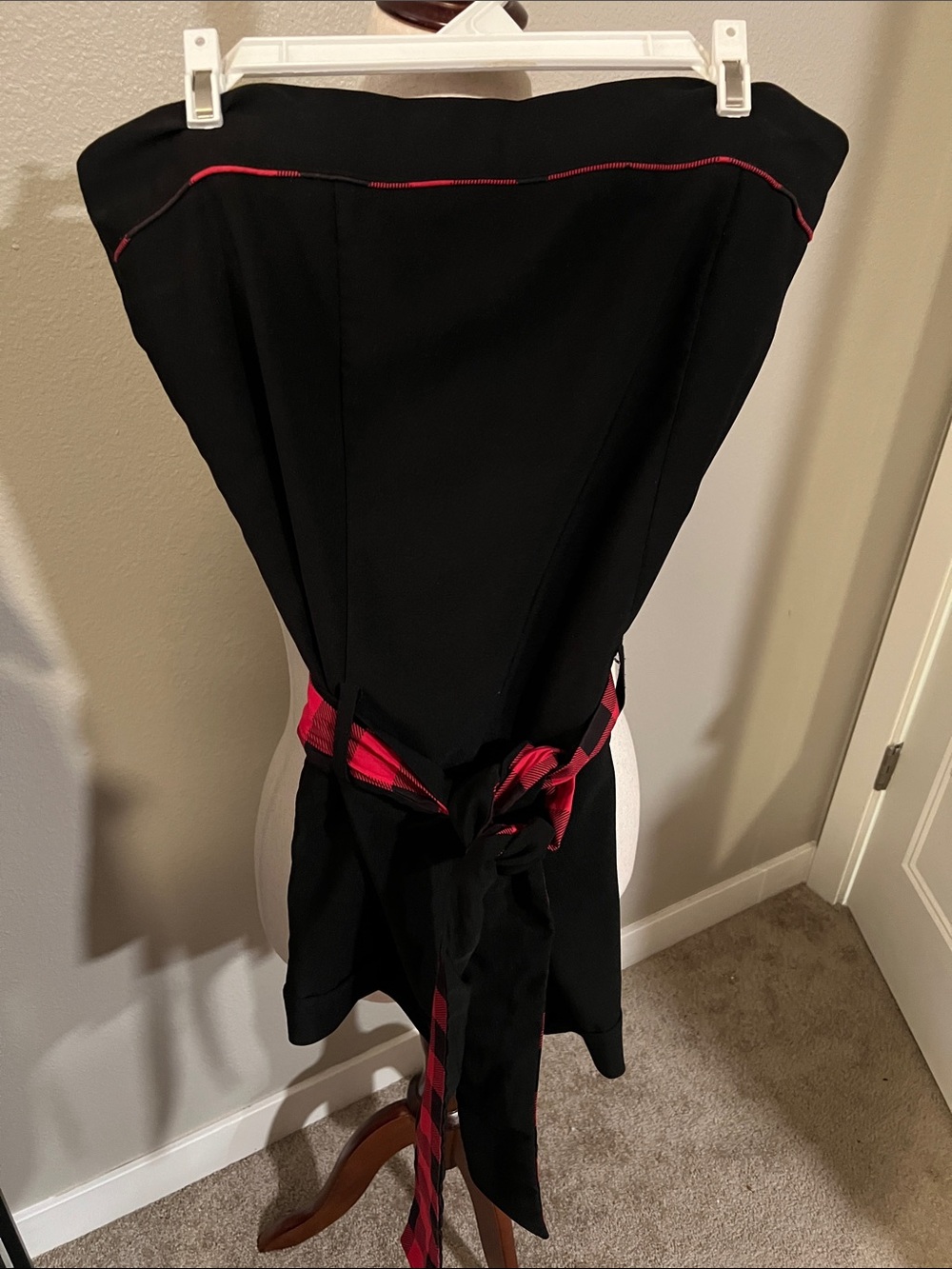 Black One-Piece Romper with Red Accent Sash